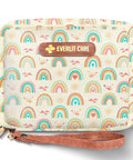 Everlit Care first aid kit pouch; rainbow patterned fabric with brown patch logo and zipper
