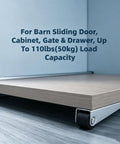 Top Shelf Vertical Track Roller Wheels For Heavy Sliding Doors And Cabinets Plus Silky Smooth Rubber Casters With No Hassle Anti Sag Design For Effortless Drawer Glide And Gate Swings Two Pack showing a close-up of a roller wheel under a sliding cabinet door.