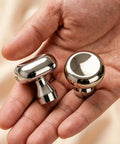 Slick Silver Cabinet Knobs and Drawer Pulls Set, Polished Zinc Alloy With Titanium Coating held in hand