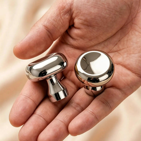 Slick Silver Cabinet Knobs and Drawer Pulls Set, Polished Zinc Alloy With Titanium Coating held in hand