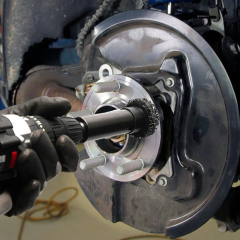 Pro Grade Wheel Hub Resurfacing Kit With Metal Housing And Brake Surface Cleaner For Studs in use on wheel hub
