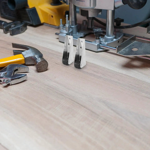 Killer Durability Heavy Duty Sliding Door Track Pulley Roller Set with Zero Friction Silent Glides on a workbench with tools.