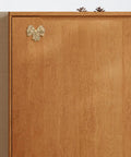 Luxurious Vintage Brass Bow Drawer Handles For Furniture And Boxes. Small gold bow pull on wooden cabinet door.