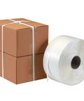 Five Eighths Inch White Poly Cord Strapping Coil Three Thousand Feet Of Durable Moisture Resistant Cording For Outdoor Use Perfect For Hand Tying Or Using Seals And Buckles 1 Coil next to packed boxes