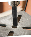 Hydraulic Punch Driver Kit For Electrical Conduit And Metal Sheets 8-Piece Hole Punch Set in action on metal surface
