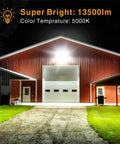 LED Outdoor Flood Light 150W 13500Lm illuminating a large barn with 330 degree coverage at night
