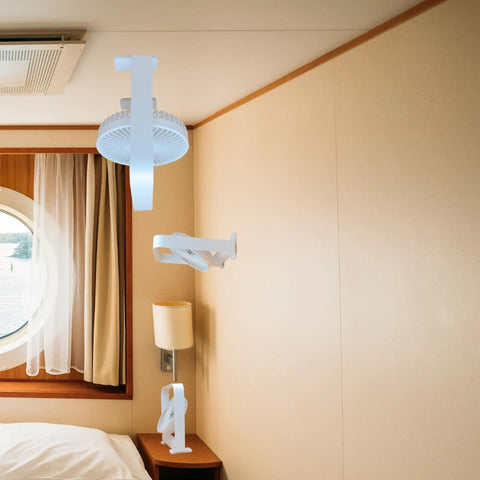 Ultra Thin Magnetic Cruise Fan That Locks Onto Walls Or Ceilings Solid Grip Portable Rechargeable Cooling Buddy mounted in a cruise stateroom.