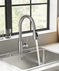 Top Shelf Brushed Nickel Kitchen Faucet With Pull Down Sprayer And Three Spray Modes Built From Solid Stainless Steel For A Slick Finish And Zero Hassle Maintenance That Keeps Your Sink Looking Dope in a modern kitchen.