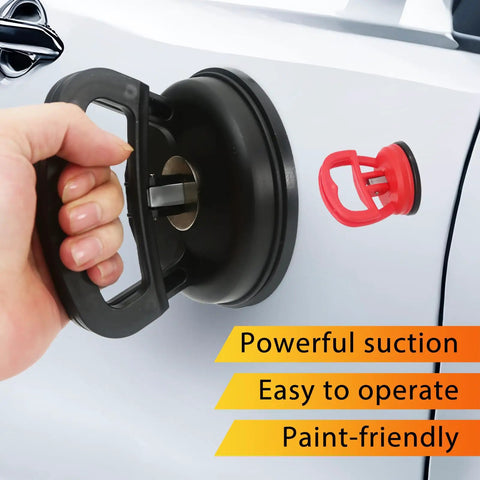 Orange Suction Cup Dent Puller Kit For Car Body Repair With Dent Remover Tool And Two Small Dent Repair Tools Includes Microfiber Wash Mitt For Hail Damage And Easy Auto Body Dent Fix. Black large suction cup on car panel, red tool рядом