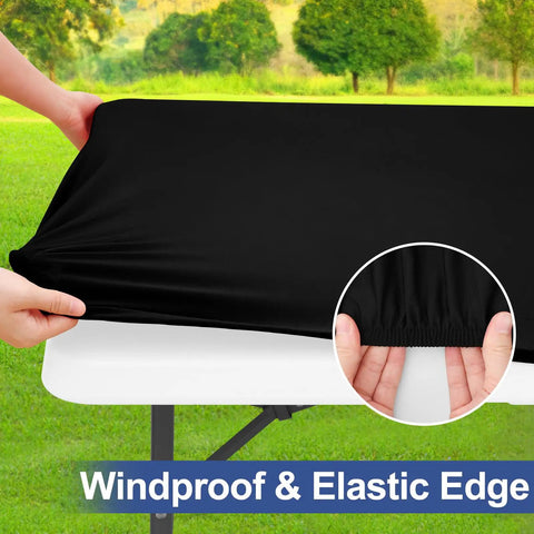 Hands stretching black Super Stretch Spandex Tablecloth For 6 Foot Tables Fitted Elastic Cover That Stays Put Washable Outdoor Patio Cloth For Camping And Parties 30 X 72 Inches