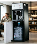 Bottom Loading Floor Standing Water Dispenser With Three Temperature Settings Hot Cold And Room Temp For Coffee Tea Or Daily Hydration No Hassle Heavy Jug Swap in a stylish kitchen setting.