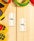 Six Pack Acrylic Self Closing Concealed Door Hinges With Spring Mechanism 45x35mm on wooden surface with tools and wires