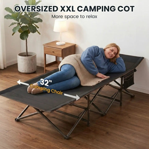 Woman lying on Oversized XXL Folding Camping Cot With Carry Bag Tough As Nails Heavy Duty in living room.
