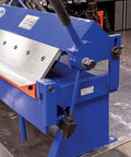 Close-up side view of 48 Inch Pan And Box Sheet Metal Brake with adjustable removable fingers in blue for 135° bends, workshop setting.
