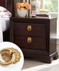 Four Pack Bronze Metal Ring Pull Handles for Cabinets and Drawers 1.2 Inch Diameter Circle Cabinet Knobs on wooden nightstand.
