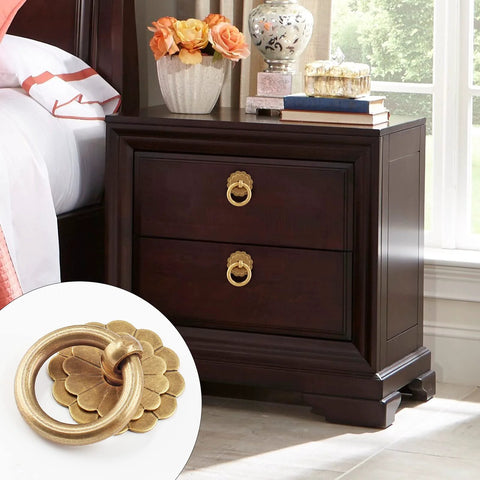 Four Pack Bronze Metal Ring Pull Handles for Cabinets and Drawers 1.2 Inch Diameter Circle Cabinet Knobs on wooden nightstand.