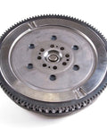 Premium Dual Mass Clutch Flywheel Kit For 2004 To 2005 Audi S4 V8 4.2L Engine showing dual mass flywheel with teeth and drilled holes.