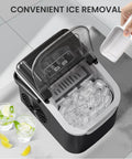 Portable Countertop Ice Maker That Makes Bullet Ice Pretty Dang Fast With Zero Fuss And Self Cleaning Features Providing Two Cube Size Choices For House Parties Producing 26 Pounds Daily In Modern Black with ice removal scoop.