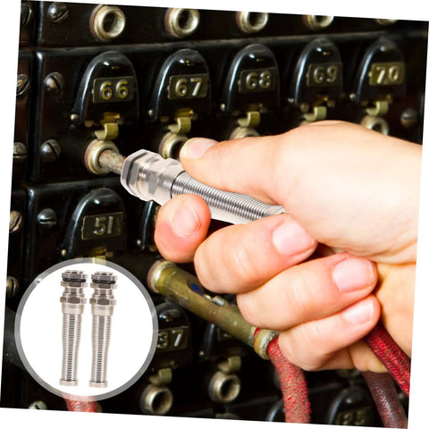 Hand installing a Brass Cable Glands Kit 4 Pack With 2 Way Glands And Metal Connectors on electrical panel, silver finish.