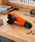 Workhorse Heavy Duty Handheld Angle Grinder Perfect For Wood Metal Cutting Rust Stripping And Quick Trim Work In Tight Corners With No Sweat Handling on wooden workbench.