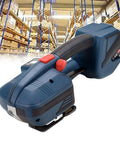 Heavy Duty Electric Strapping Machine Featuring Hot Melt Friction Lock And Rock Solid Adjustable Tension For Thick Tire Bundles and No Sweat Industrial Packing Workflows in a warehouse setting.