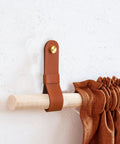 Six Piece Robust Leather Curtain Rod Holders With Universal Wall Mount Kits For Towel Bars And Fresh Home Decor Looks Featuring Zero Hassle Screws That Actually Deliver Top Shelf Quality, brown leather holder on wooden rod.