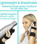 Woman wearing Full Trigger Finger Splint for Hand and Wrist Support, holding phone and bottle, showing practical use