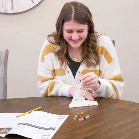 STEM Innovator Pack 4 In 1 Hands On DIY Projects For Teens 15 Plus Fun Educational Construction Kits For Home Classroom Camp And After School Learning teen assembling paper catapult at table