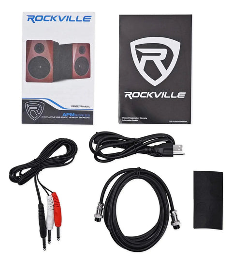 APM6B Powered USB Studio Monitor Pair accessories with cables, manual, and brochures for home studio setup.