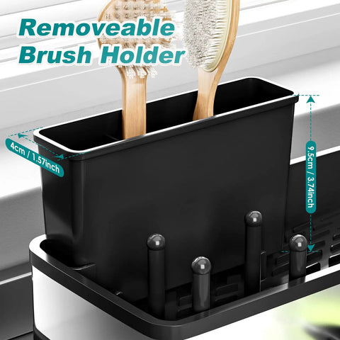Close-up of stainless steel sink caddy with a sponge holder and brush holder, shown in modern black finish for kitchen countertop.