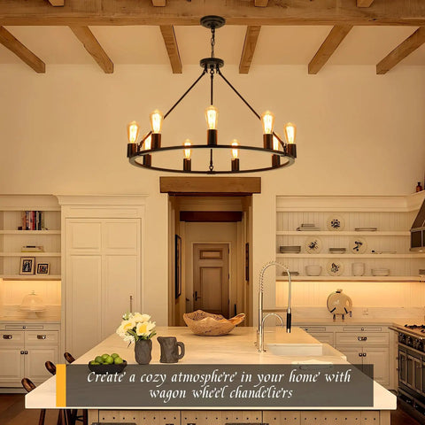 Black Wagon Wheel Chandelier Total Showstopper Lighting Fixtures Bring The Farmhouse Vibes To Your Dining Room Or Kitchen With This 9 Light Pendant hanging over a kitchen island.