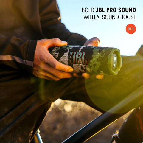 Person holding Bangin Portable Waterproof Speaker With Pro Sound And AI Boost, Deep Bass And Crisp Highs, 16 Hours Of Play, PushLock System.
