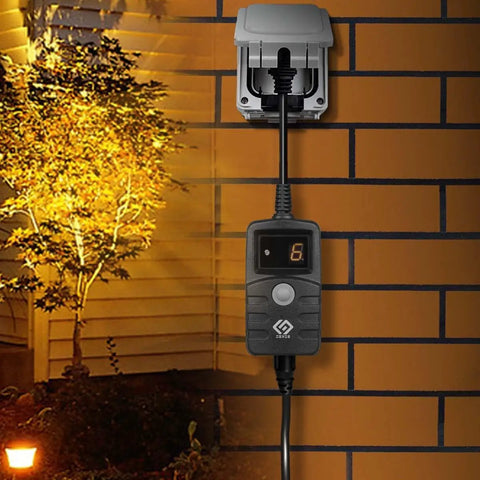 Slick Outdoor Light Timer With Hassle Free Photocell Dusk To Dawn Sensor and weatherproof countdown plug mounted on a wall.