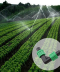 90 Degree Drip Irrigation Elbow Fittings Set For 16 To 17 mm Tubing Barbed Locking L Shape Connectors With Twist Lock Design Leak Proof Connections 8 Pc Green Kit For Custom Sprinkler And Garden Layout featured with operating sprinklers in a field