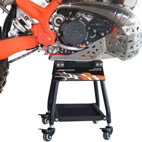 Detachable Dirt Bike Stand With Wheels And Tool Tray, Heavy Duty Maintenance Stand For Dirt Bikes And Pit Bikes, Movable Motorcycle Lift With Locking Casters, No Fuss, Easy Roll, Sturdy Iron Frame, 330 Pound Capacity shown under a bike