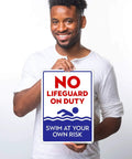 Man holding No Lifeguard On Duty Pool Sign, Blue 10x14 Inches, Rust Free.040 Aluminum, made for indoor and outdoor use.