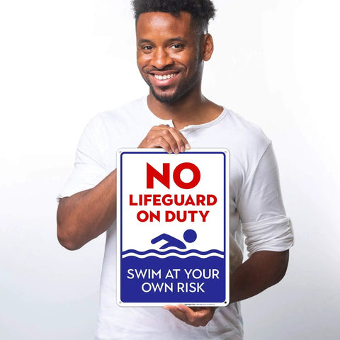 Man holding No Lifeguard On Duty Pool Sign, Blue 10x14 Inches, Rust Free.040 Aluminum, made for indoor and outdoor use.