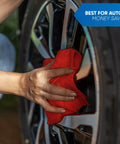 Person using Red Cotton Shop Towels 100 Percent Cotton Multipurpose Mechanic Garage Rags Highly Absorbent Auto Detailing Cloths 12x14 Inches Pack Of 25 Ideal For Oil Wipes Messes And General Cleanup In The Shop to clean car wheel close-up