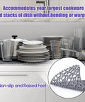 Non Slip Silicone Sink Protector Mat For Kitchen, Heat Resistant Grid Design With Center Drain, Keeps Glassware Safe, Flexible And Easy To Clean, 24.8x13 Inches, Gray shown in kitchen sink with dishes