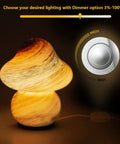 Pacifier Shaped Mushroom Lamp With Stepless Dimmable Glass Bedside Table Lamp glowing in dark, showing dimmer settings.