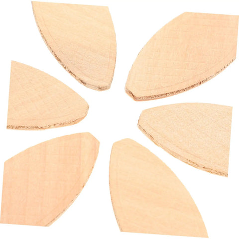 Six wooden joining biscuits from the Knockout 100 Piece Wood Biscuit Joiner Kit for secure woodworking and furniture repair.