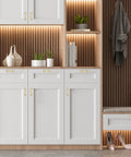 Modern kitchen with white cabinets featuring Brushed Brass 3 Inch Cabinet Handles Set Of 10 In Solid Zinc Alloy for door drawers.