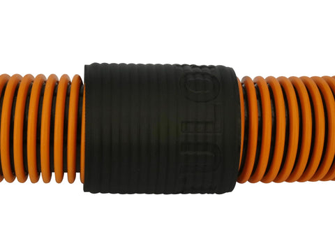 Vacuum hose with orange spiral tubing and black plastic coupler, close-up view