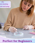 Person crafting a coaster with the Coaster Making Kit With Epoxy Resin 16oz Molds Mica Powder Gold Flakes Mixing Cups Gloves.