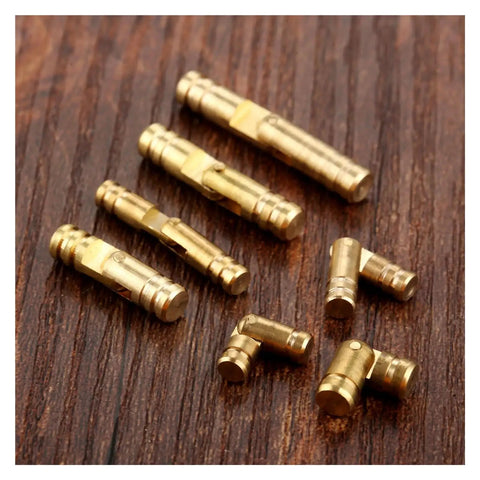 4 Pcs Copper Invisible Concealed Barrel Hinges For Jewelry Boxes And Lil Cabinets arranged on wooden surface