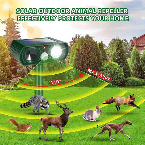Outdoor Solar Powered Ultrasonic Animal Repeller With Motion Sensor And LED Flashing Light, positioned in a green field