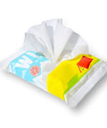 Biodegradable Body Wipes With Tea Tree Oil And Aloe Vera On The Go Fresh Wipes pack with one wipe partially pulled out