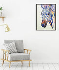 Modern living room with framed zebra art above chair, demonstrating Peel And Stick Molding And Wall Trim Set For DIY Home Decor On Cabinets Doors Mirrors And Frames Self Adhesive No Mess Easy Install Non Toxic 16.4 Ft Long By 0.8 In Wide.