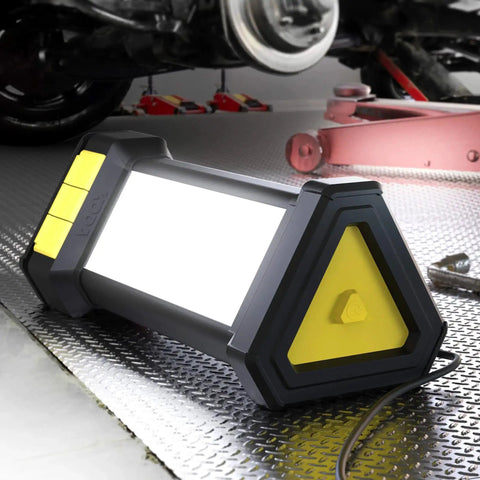 Tower Work Light Delivers 9000 Lumen Brightness With Full 360 Degree Illumination, placed under vehicle on garage floor