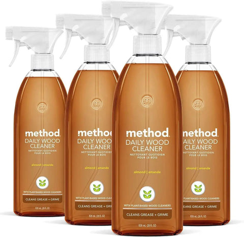 Four 28 oz bottles of almond scent daily hardwood cleaner for wood surfaces like tables, shelves, and counters; cruelty free.